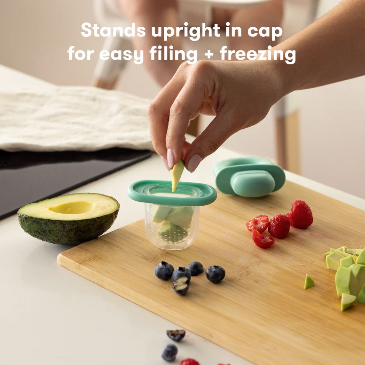 Frida Baby Push Pop Baby Food Feeder - Light Teal Blue - Safe and Controlled Feeding